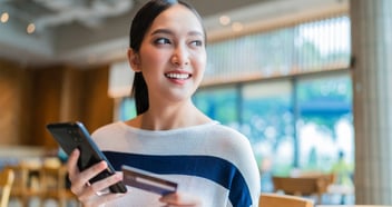 Girl using credit card