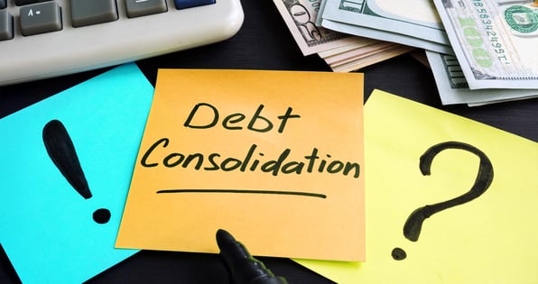 Sticky Note with Debt Consolidation Written On It