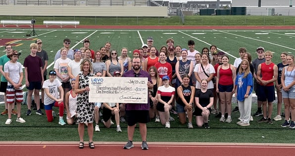 Harrisburg Band Boosters' Accepts a Donation from Levo Credit Union