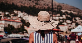 Woman wearing sunhat at beach