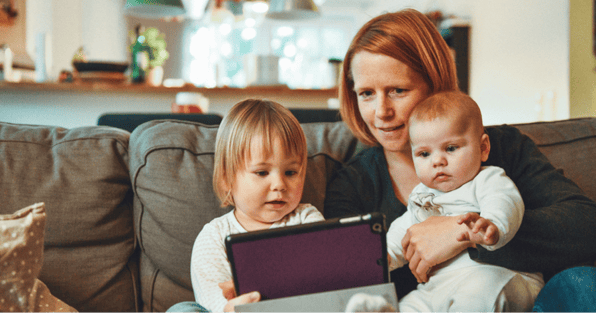 Family looking at tablet