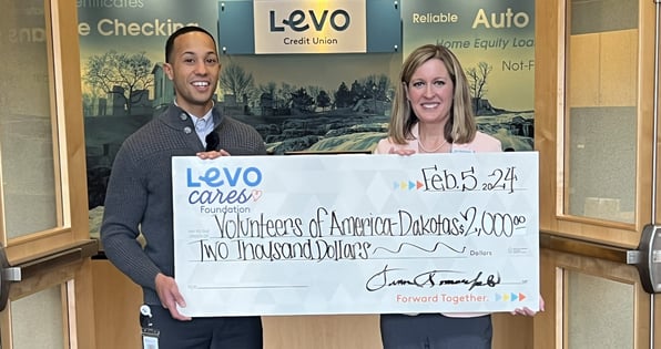 Volunteers of America Dakotas Check Presentation from Levo Credit Union