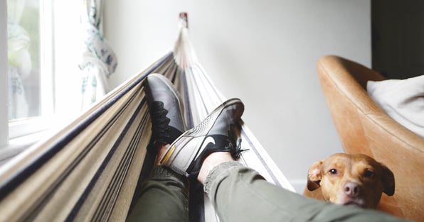 Man laying on hammock