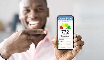 Man showing his credit score