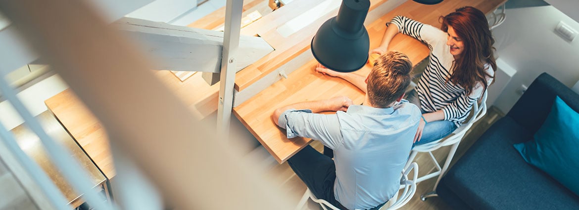 woman-man-sitting-in-business